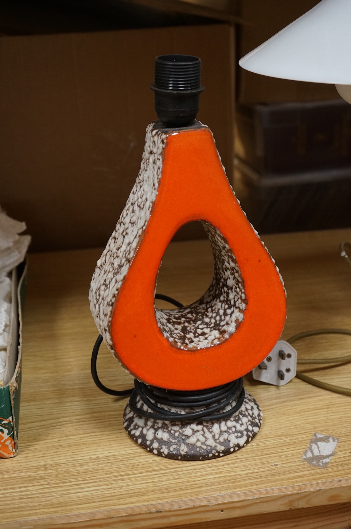 Two lamps comprising a 1960s Herdu ceramic lamp together with a brass and copper adjustable desk lamp, largest 56cm high